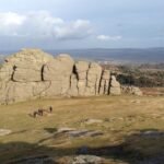 Dartmoor's iconic Haytor with Bovey Tracey in the distance