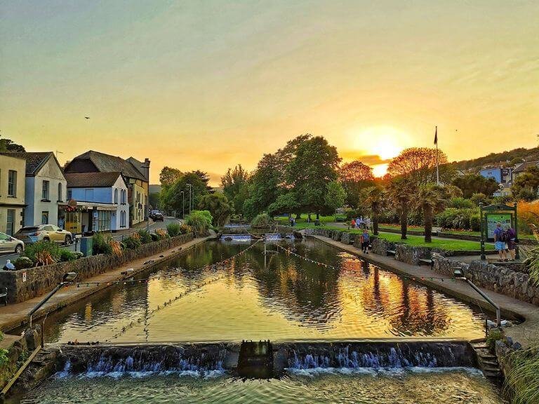 Sunset over the large brook in Dawlish