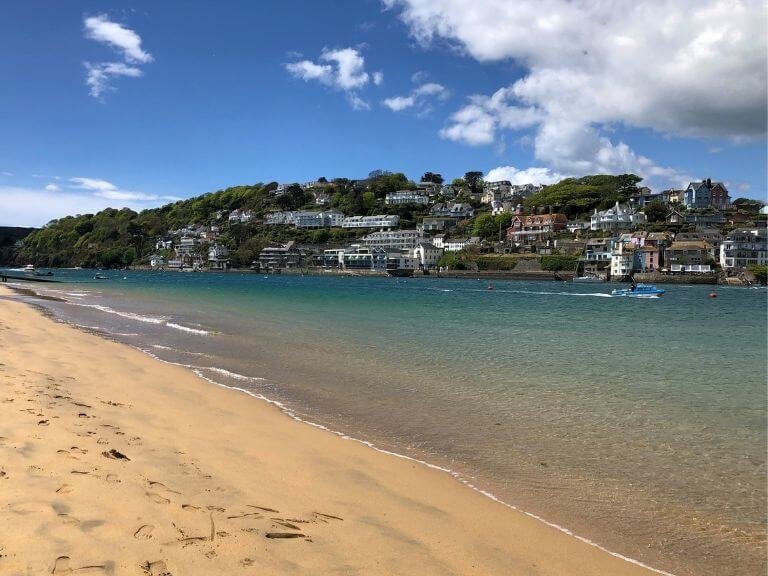 View of Salcombe from sandy beach across the estuary