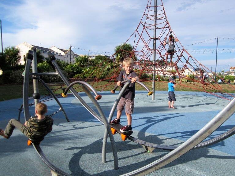 Children having fun in Teignmouth's large seaside play park