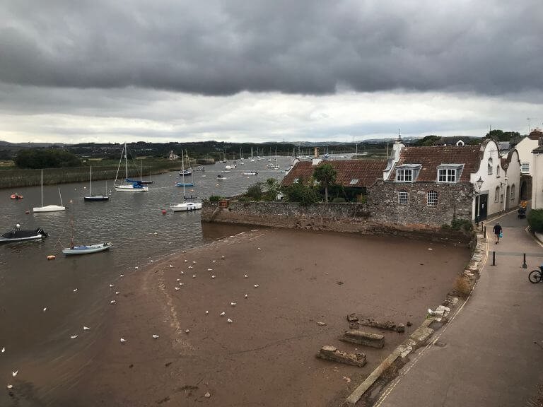 Yachts achored on the River Exe at Topsham under a threatening sky