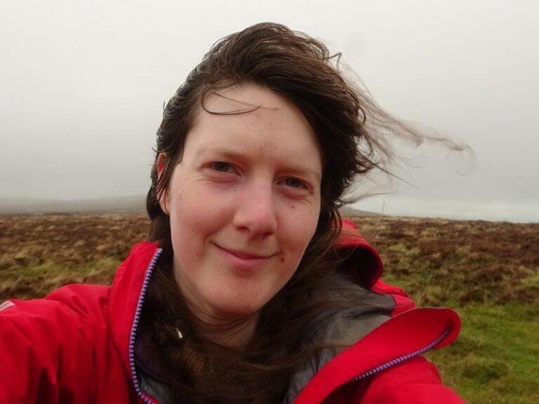 Selfie of young lady on bleak moorland